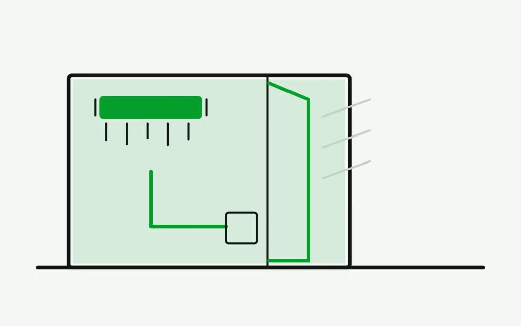 Walk-in freezer in section with frost under the evaporator, an open door and a drain line running out of the box